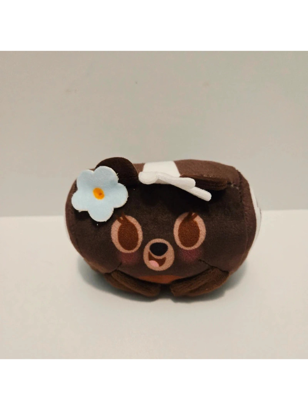 Disney Munchlings Collectible Flower Skunk Chocolate Swiss Roll